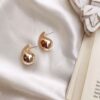 Drop shape metal earrings for office wear
