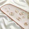 Metallic hoops and studs